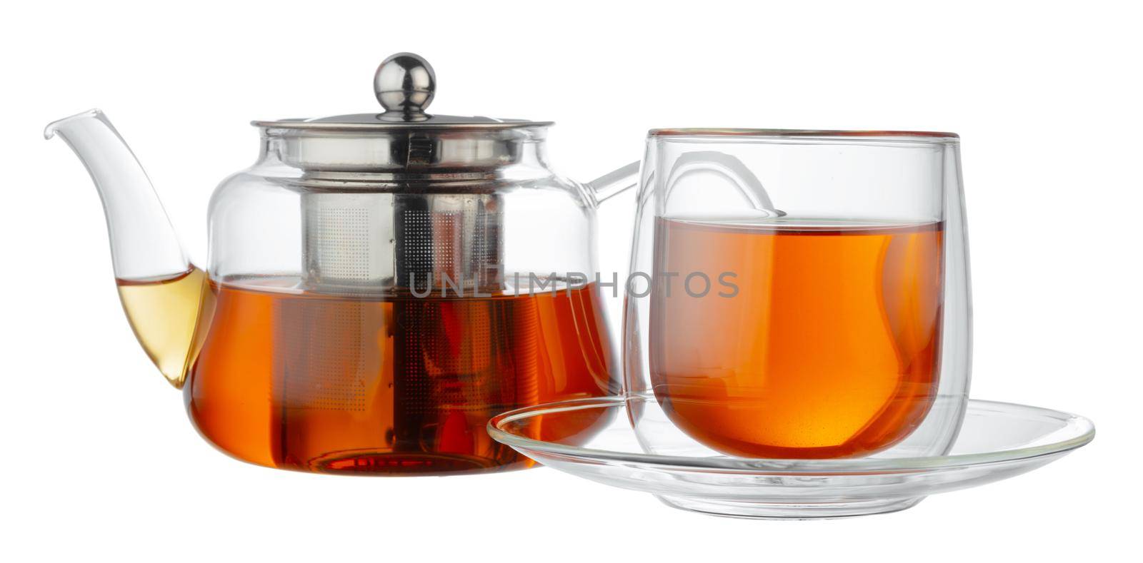 Glass teapot and glass cup with tea isolated on white background