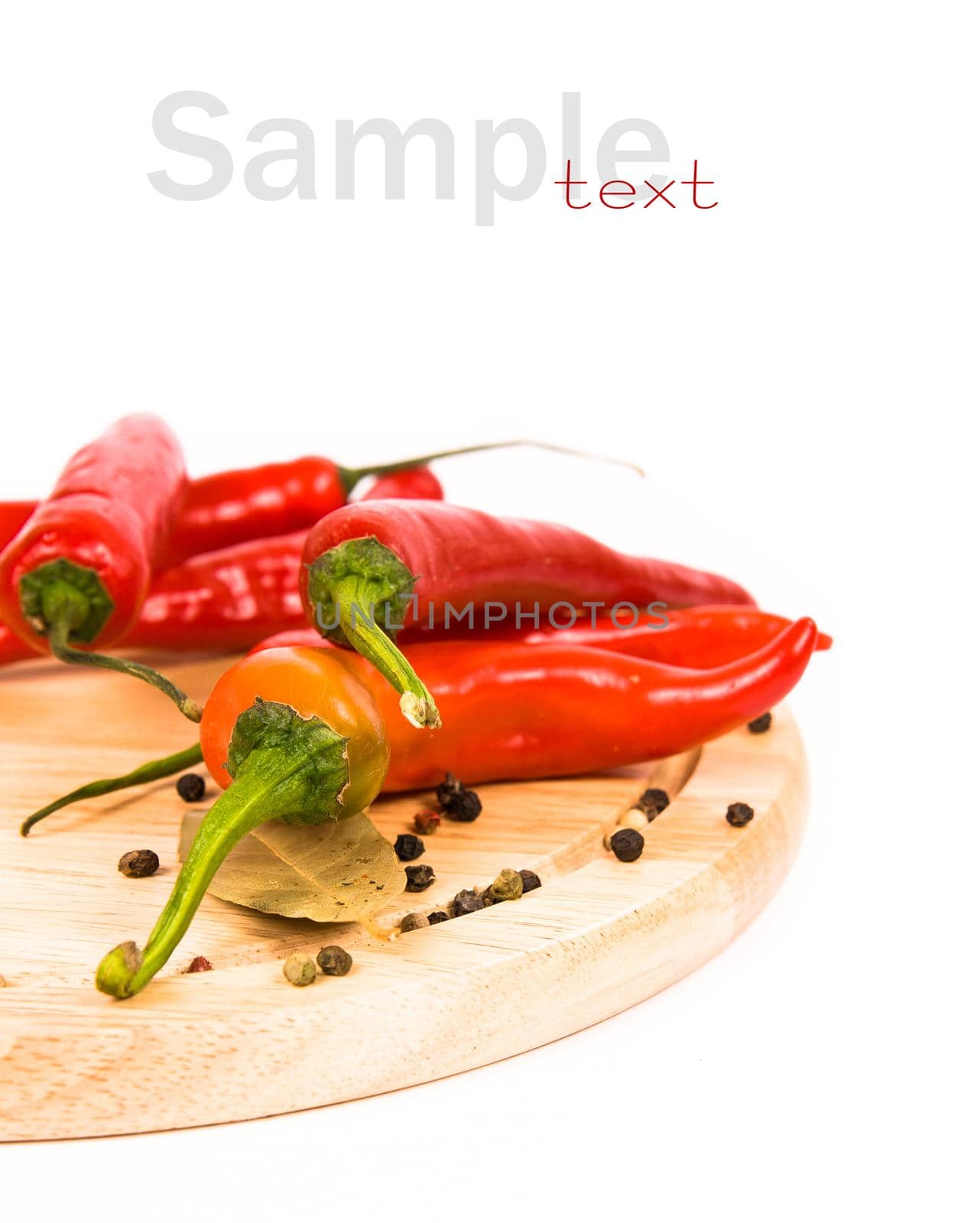 Red chili peppers over a white background