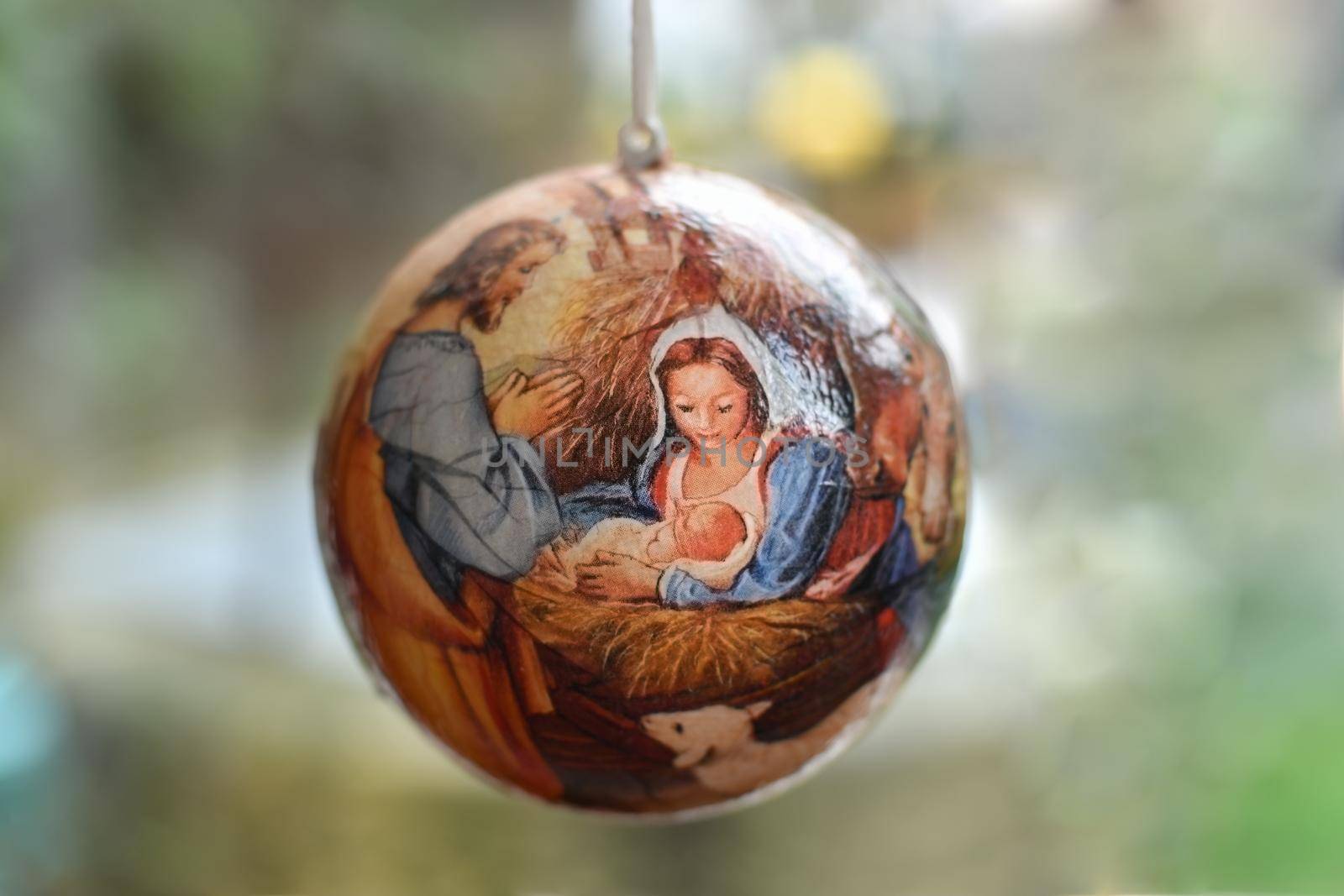 Christmas tree ball with the scene of the birth of Jesus Christ