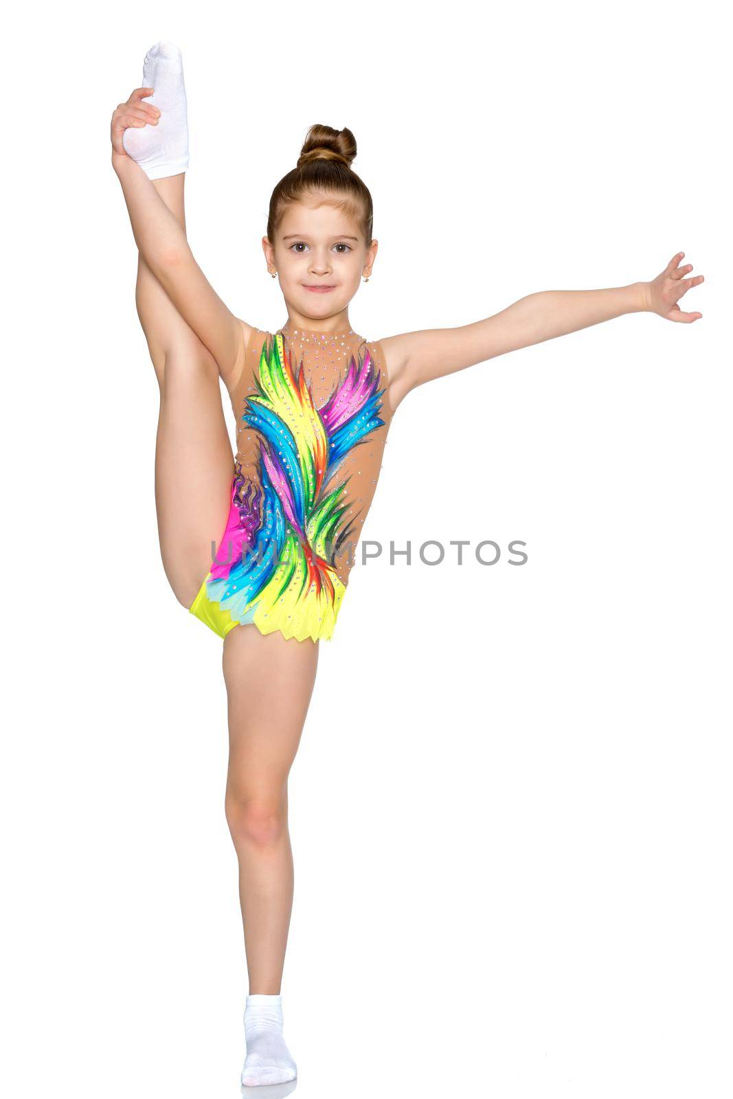 Girl gymnast perform the twine exercise. by kolesnikov_studio
