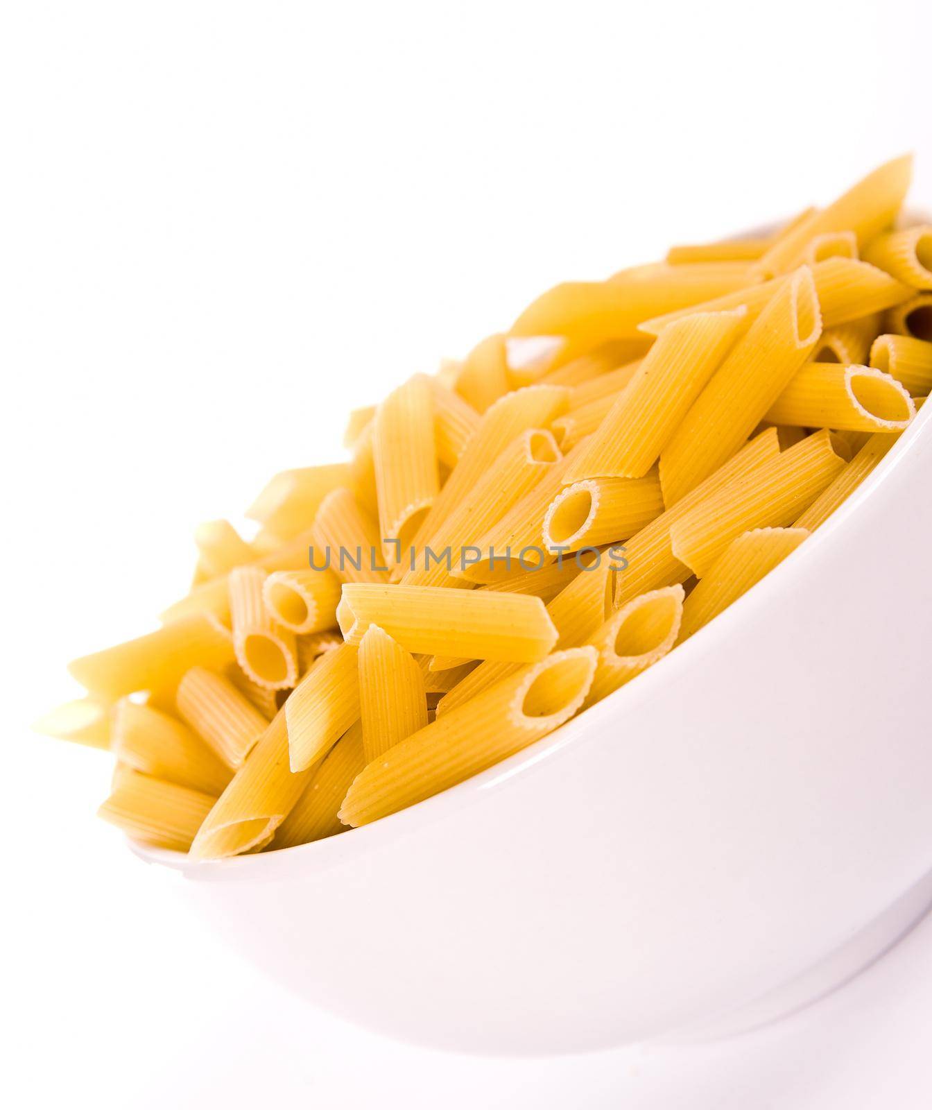 raw noodles over a white background close up
