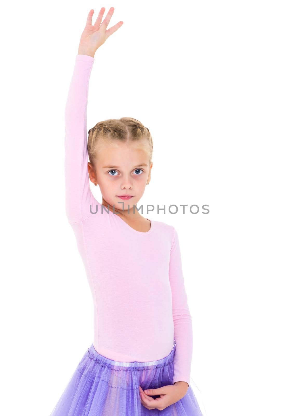 Little girl ballerina performs dance. by kolesnikov_studio