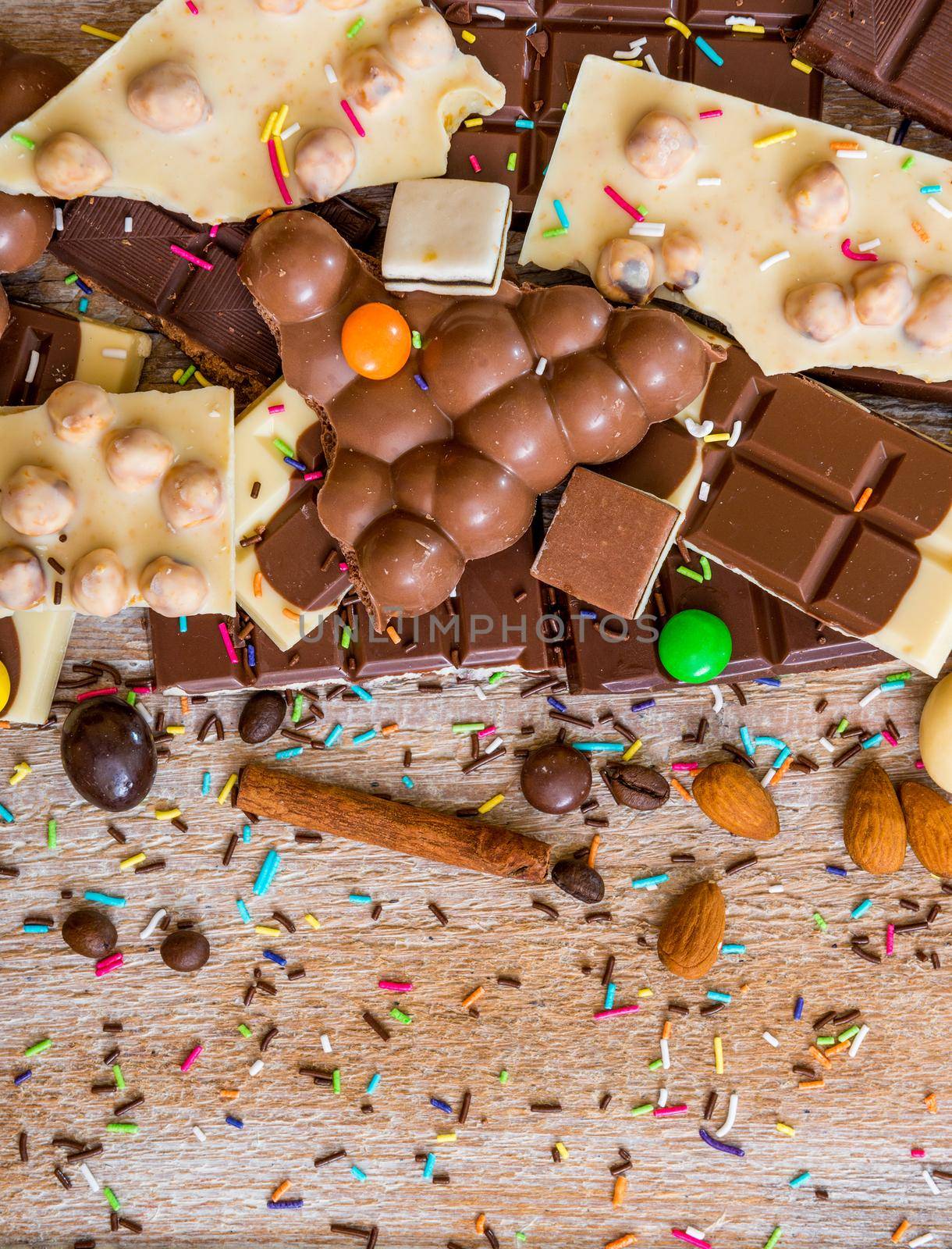 chocolate and candies on a wooden background