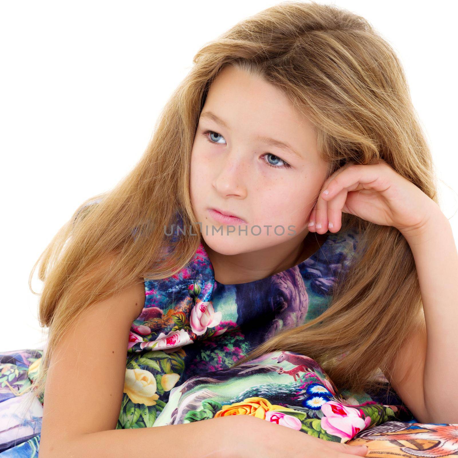 Beautiful little girl close-up. The concept of beauty and fashion, happy childhood. Isolated on white background.