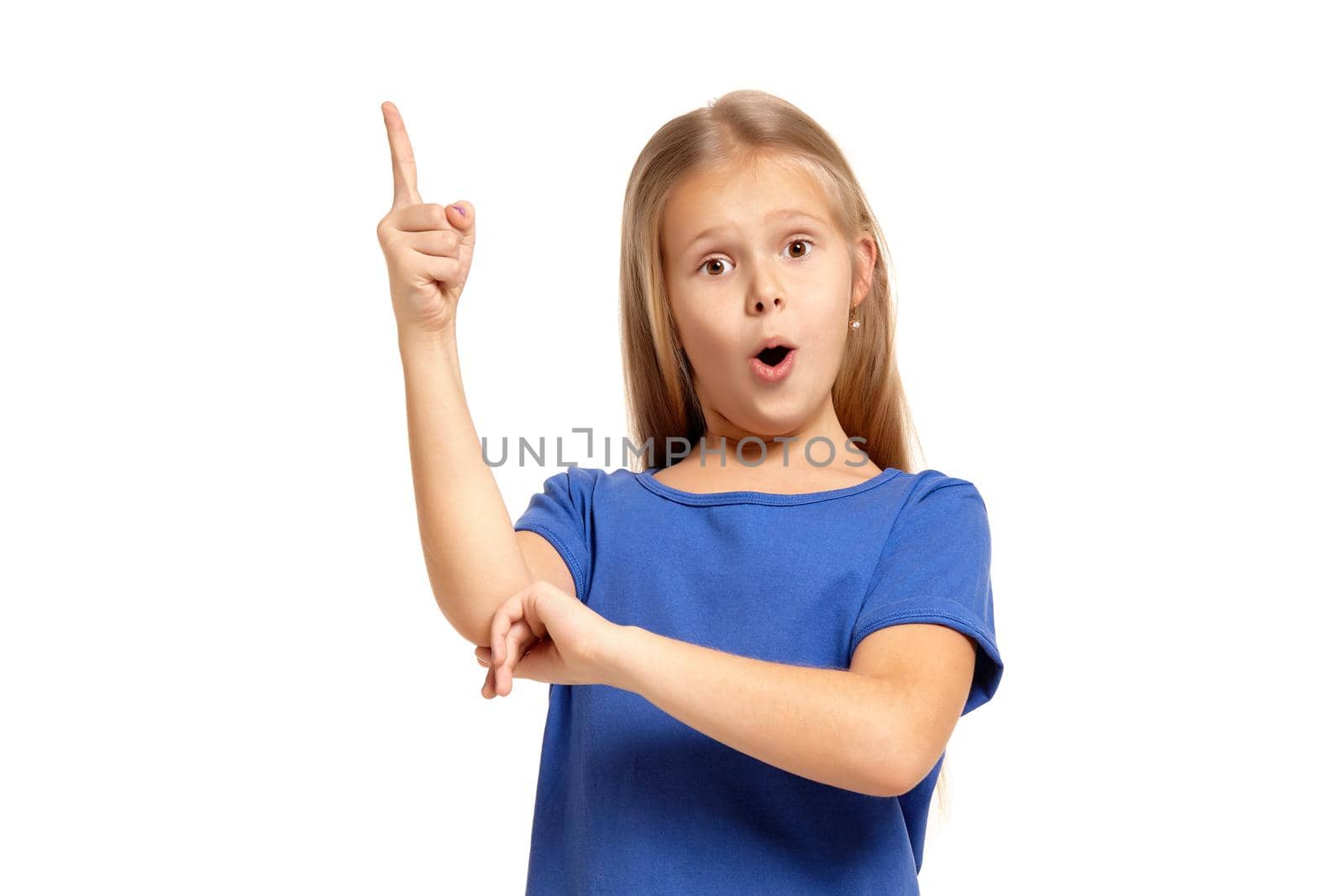 Portrait of adorable little girl isolated on a white background. in blue t-short with long white hair, pointing with finger, found solution, breakthrough