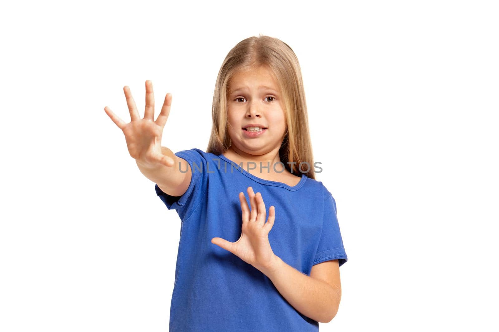 Portrait of adorable little girl isolated on a white background. in blue t-short with long white hair, asking to stop