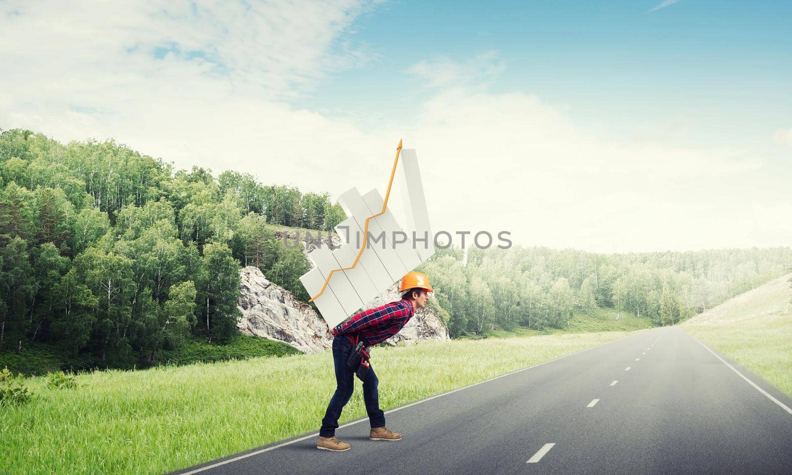 Young man builder carrying growing graph on his back