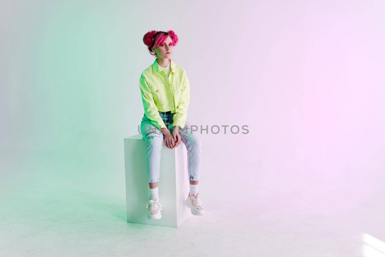 fashionable woman bright cosmetics party posing studio model. High quality photo