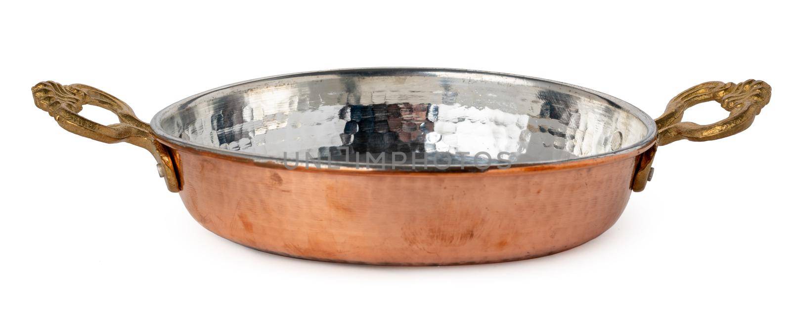 Copper cooking pan isolated on white background close up
