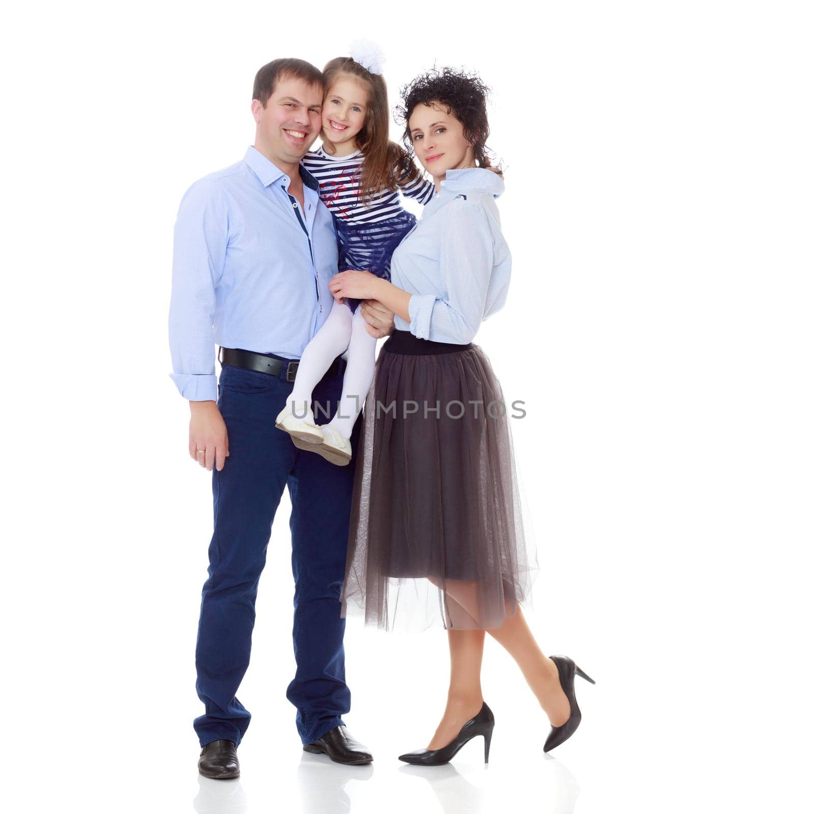 Happy young family, mom dad and little daughter.Parents keep the girl in her arms , and she hugs their neck.Isolated on white background.