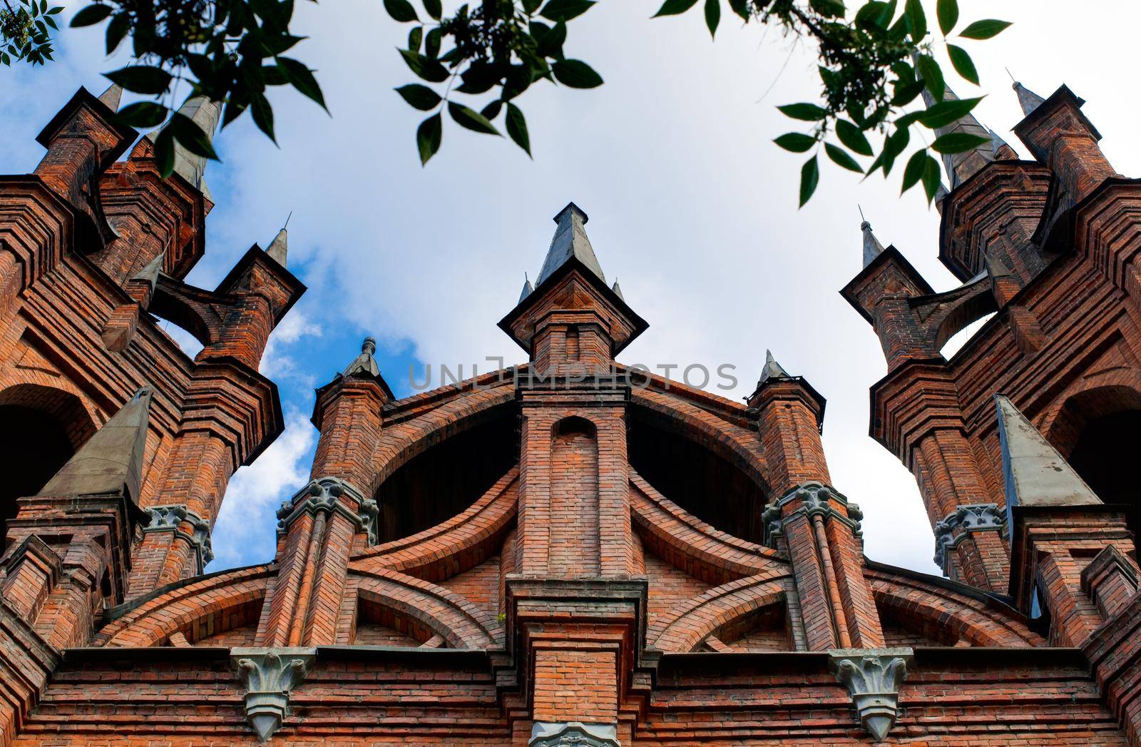 old catholic church with blue sky in background