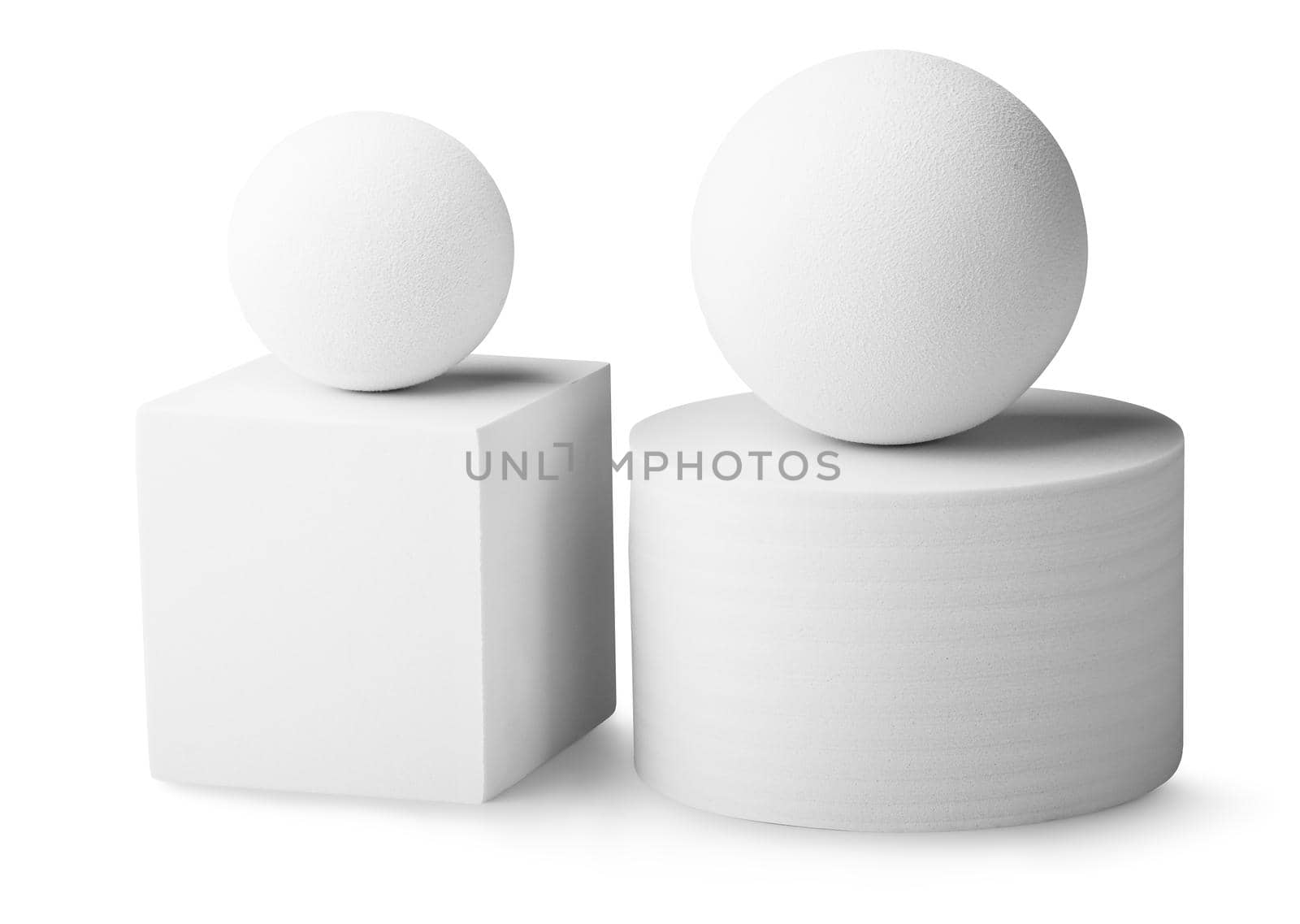 White cylinder, two balls and a square isolated on white background