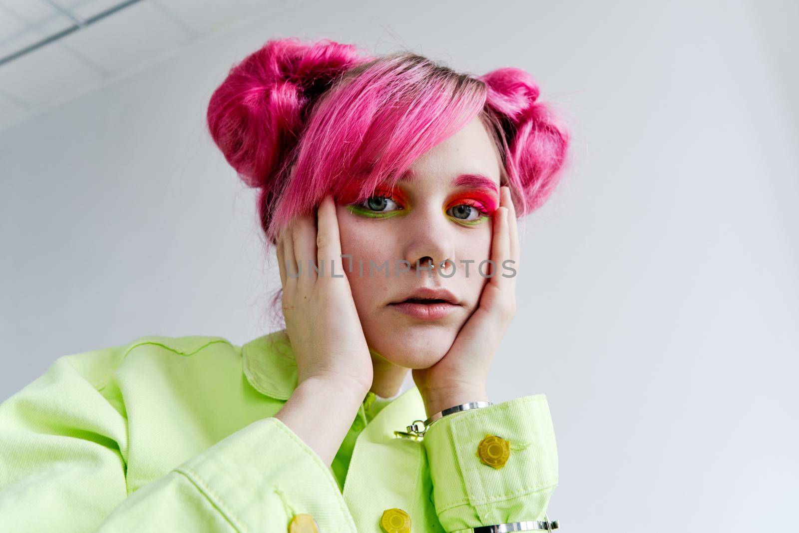 portrait of a cheerful woman pink hair hipster fashion. High quality photo