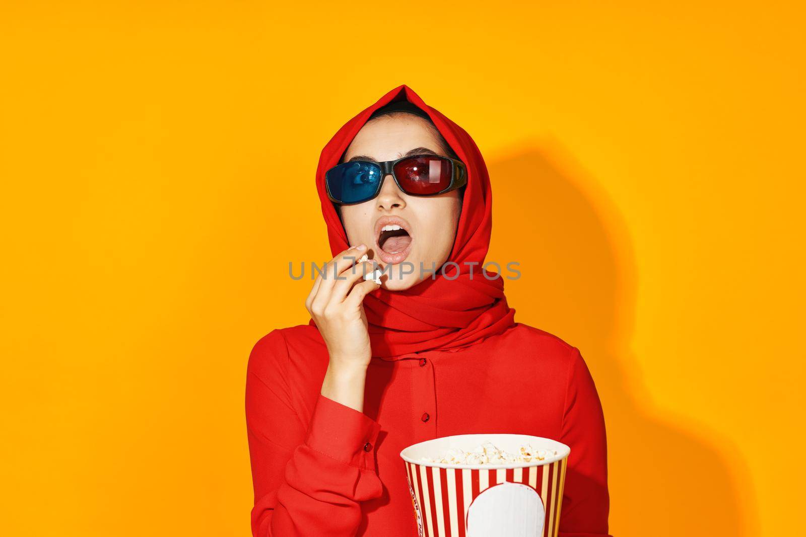Muslim virtual reality movie fashion fun movie yellow background. High quality photo