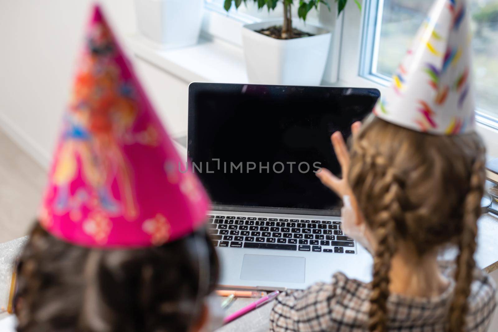 Happy family with two sibling celebrating birthday via internet in quarantine time, self-isolation and family values, online birthday party by Andelov13