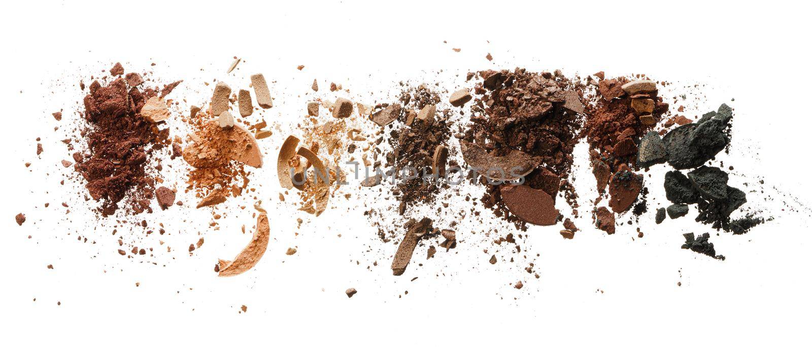 Smudged eyeshadows isolated on white background, top view, close up.