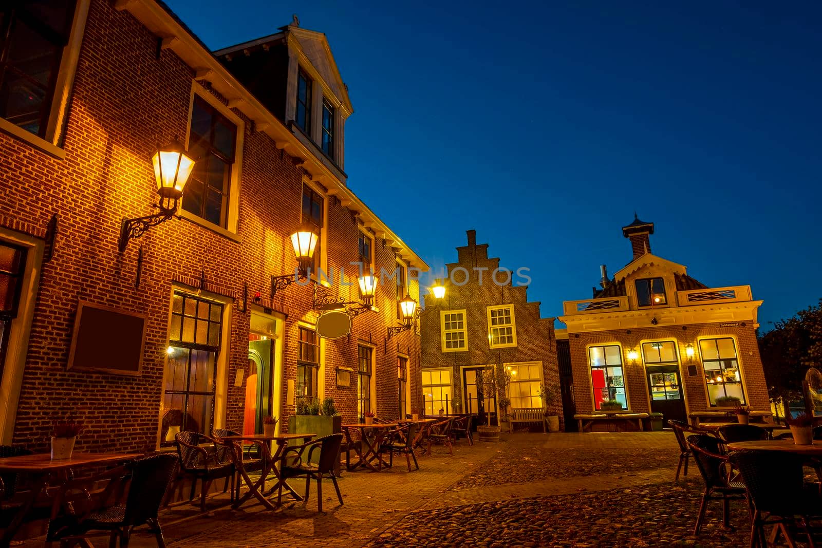 Traditional buildings in the historical city Sloten in Friesland the Netherlands at sunset