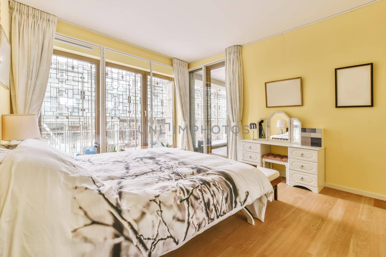 Bedroom interior with yellow walls by casamedia