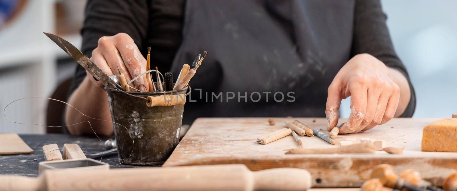 Working process of pottery with tools at home studio