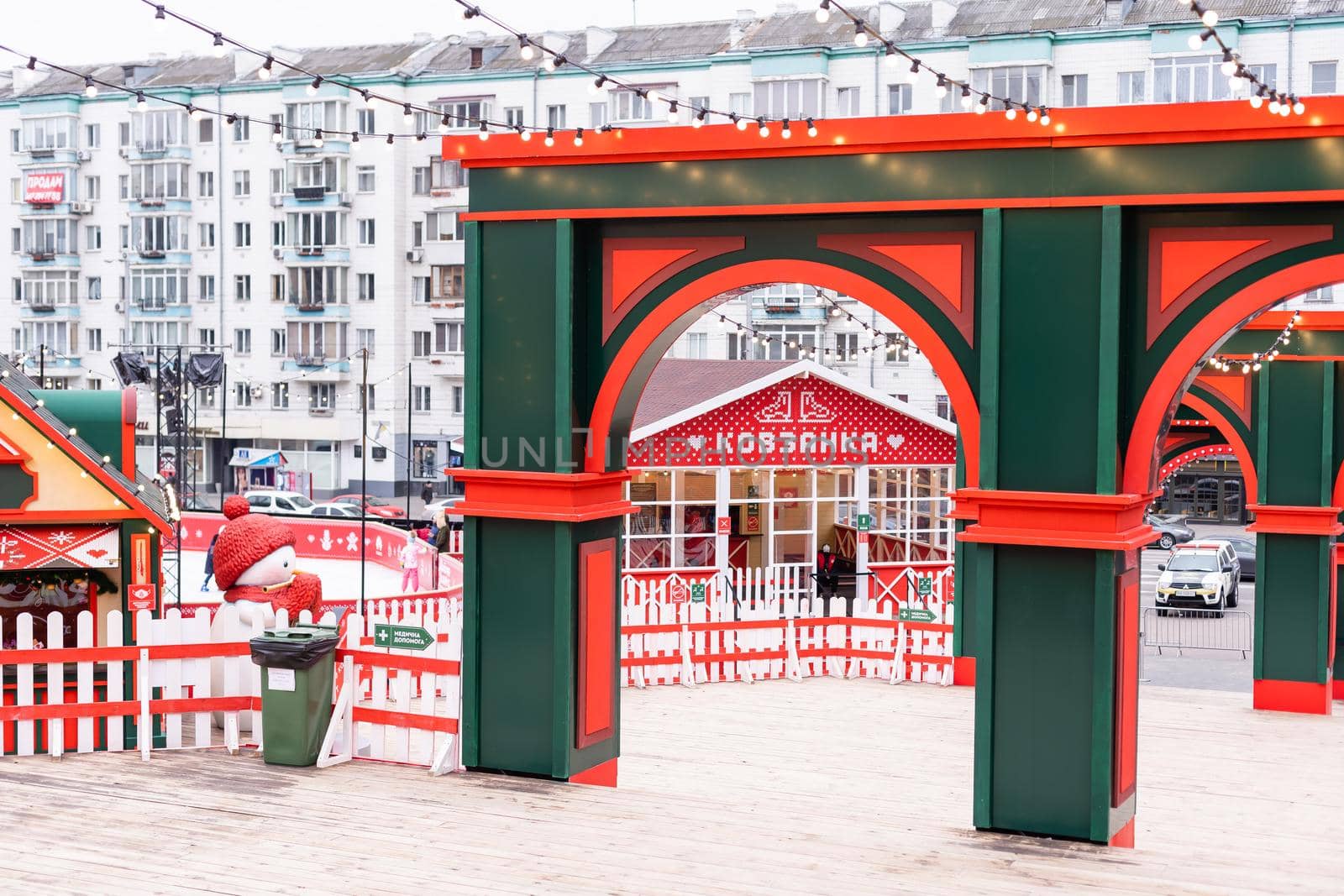 Kyiv, Ukraine - January 13, 2021: Street skating rink at the Christmas fair. Christmas Holidays at Palace Ukraine by Andelov13