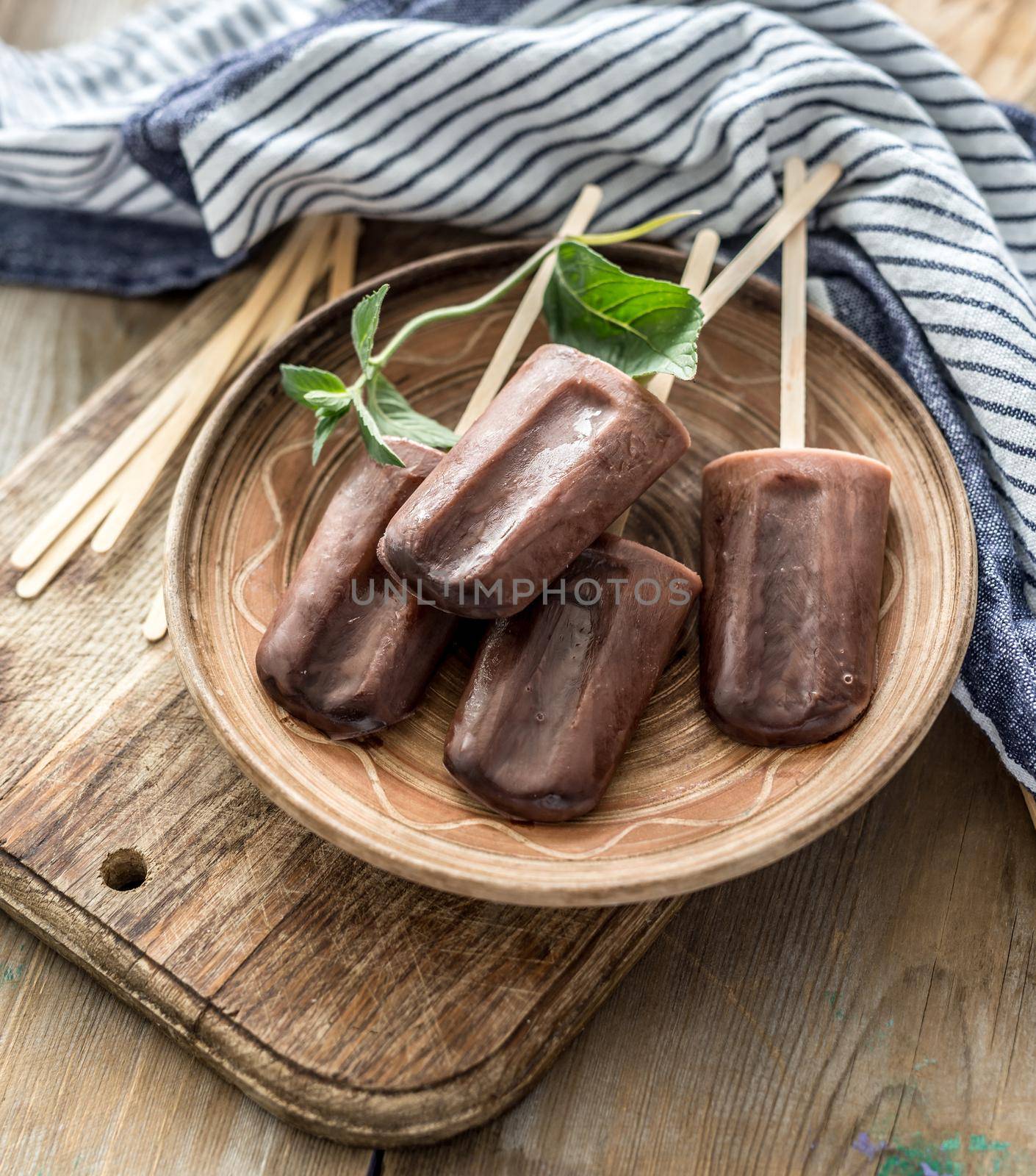 homemade chocolate ice cream on a wooden background