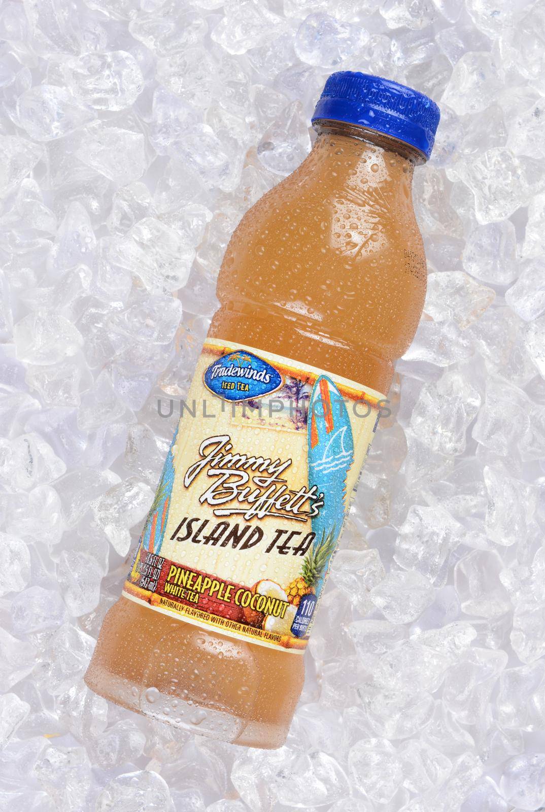 IRVINE, CA - JULY 23, 2015: A bottle of Jimmy Buffett Island Tea on ice. Tradewinds Ice Teas partenered with the singer to make a line of drinks with blends of tropical fruit flavor and iced tea.