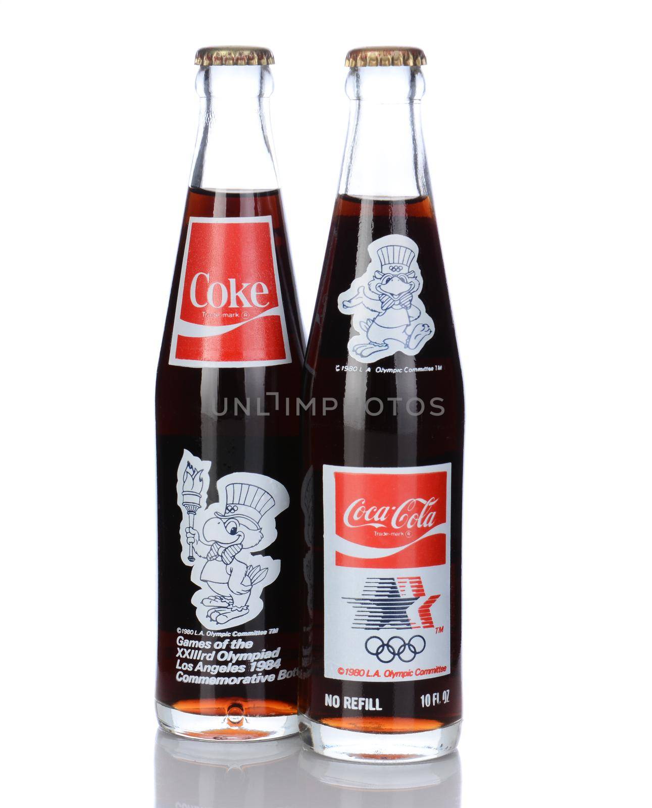 IRVINE, CA - January 05, 2014: 2 Commemorative Bottles of Coca Cola from the 1984 Los Angeles Olympic Games. The front and back of the bottles are shown with the mascot and logo.