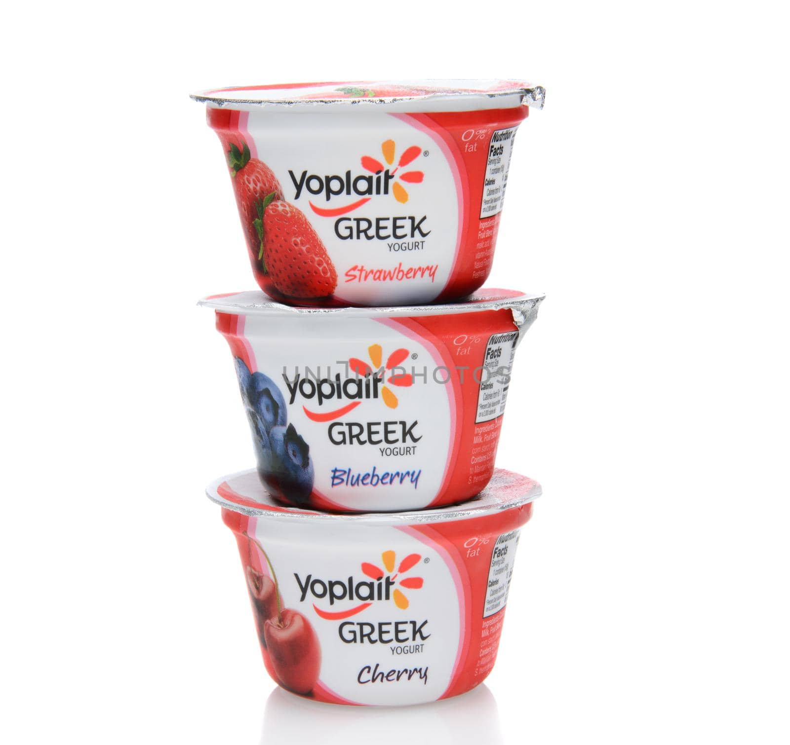 IRVINE, CA - SEPTEMBER 15, 2014: Three different containers of Yoplait Greek Yogurt. In 1965, two French dairy co-operatives, Yola and Coplait, merged, becoming Yoplait.