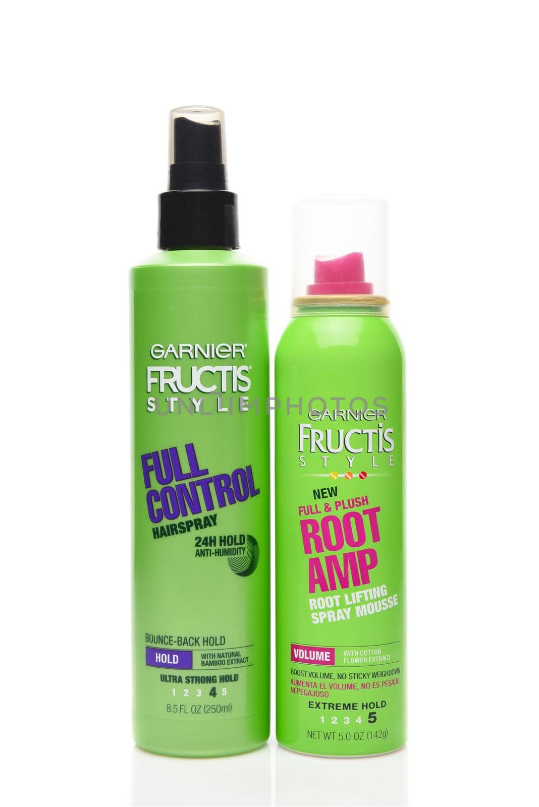 IRVINE, CALIFORNIA - AUGUST 20, 2019:  A bottle of Garnier Fructis Full Control Hairspray, and a can of Garnier Fructis Root Amp Spray Mousse.  by sCukrov