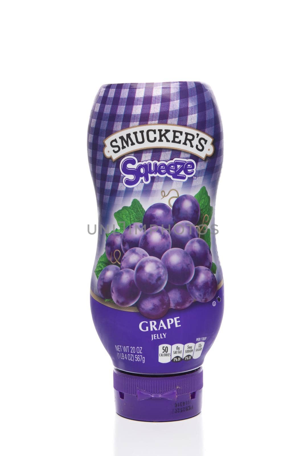 A 20 ounce plastic squeeze bottle of Smuckers Grape Jelly. by sCukrov