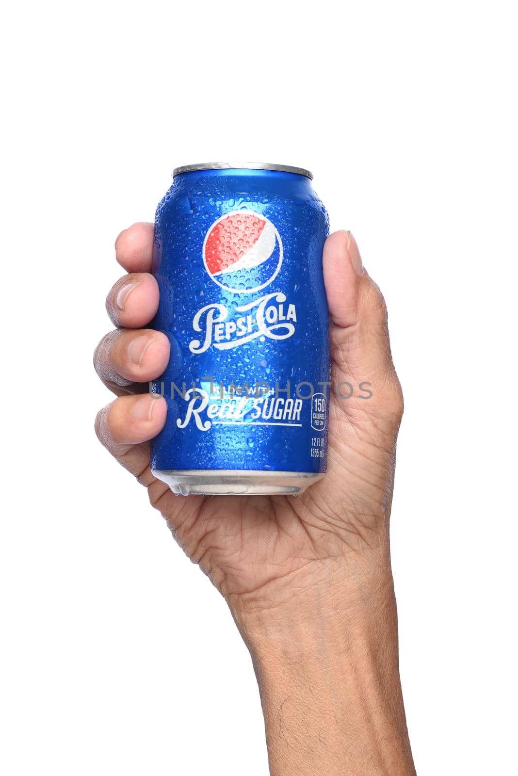 IRVINE, CALIFORNIA - APRIL 26, 2019: Closeup of a hand holding a cold can of Pepsi Cola, made with real sugar.