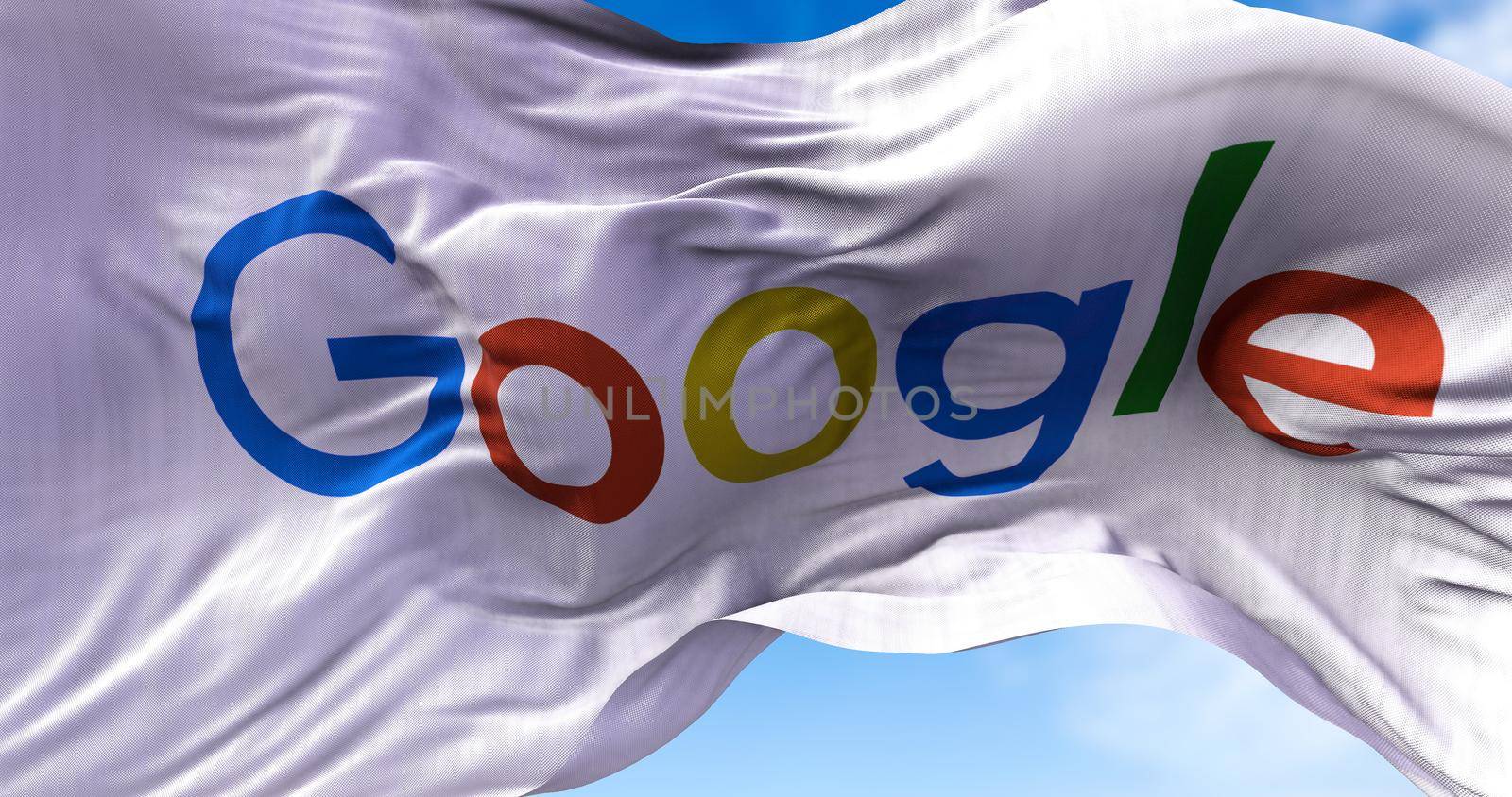 White flag with the Google logo waving in the wind. by rarrarorro