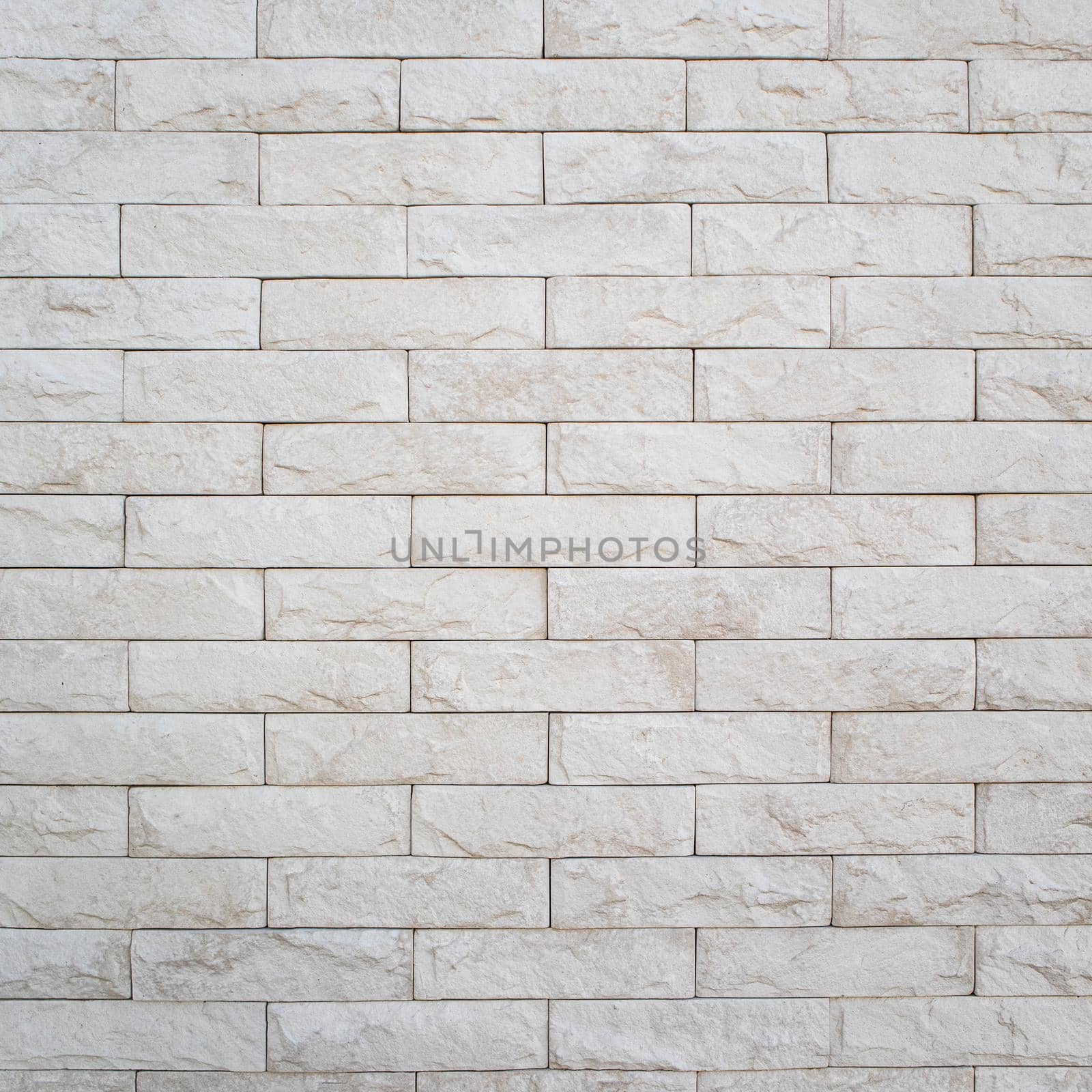 A close up of a white brick wall. High quality photo