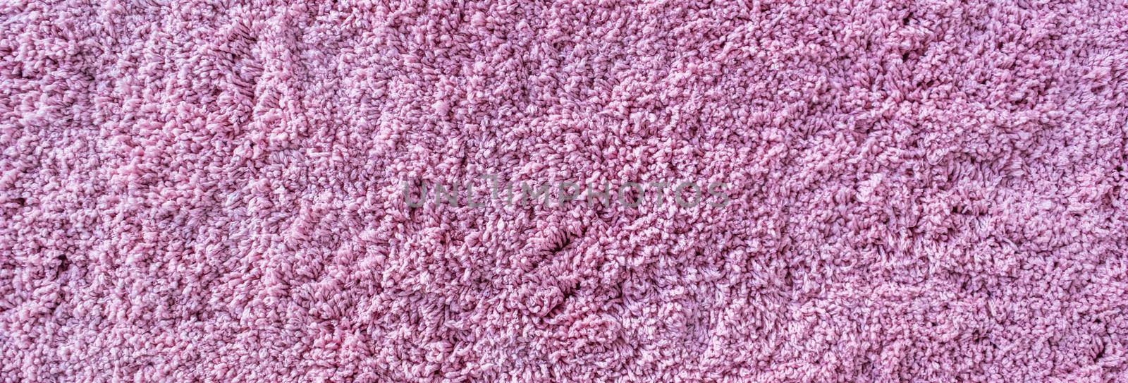 Long pile carpet texture. Abstract background of shaggy pink fibers by Olayola