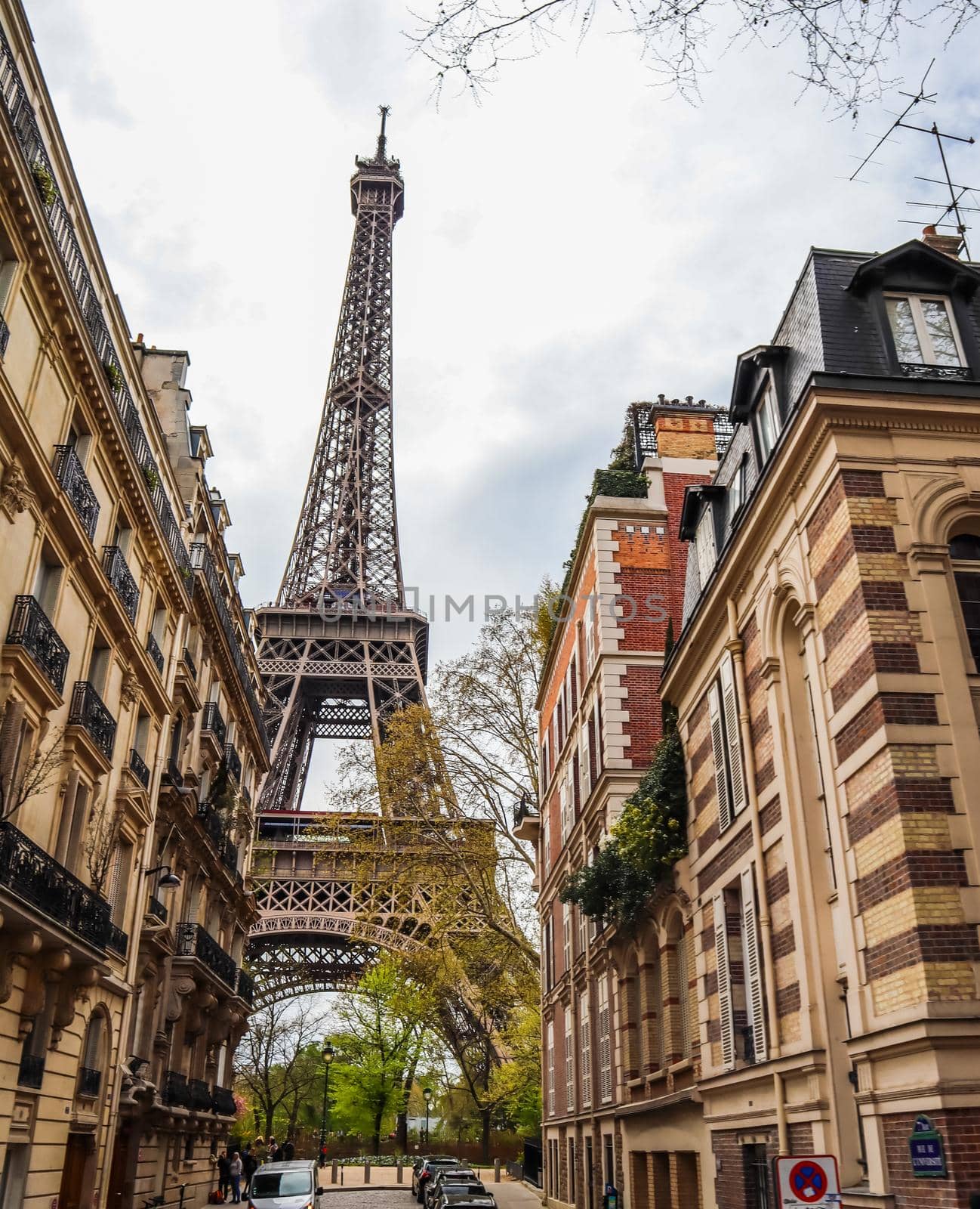 A street in Paris with Eiffel tower view. France. April 2019