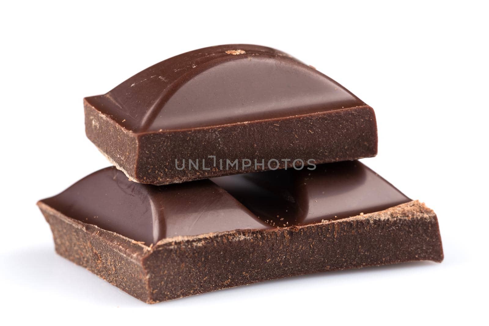 Dark chocolate bars on a white background