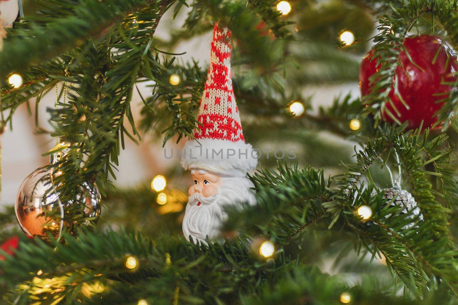 Ceramic Christmas toy Santa Claus hanging on the Christmas tree