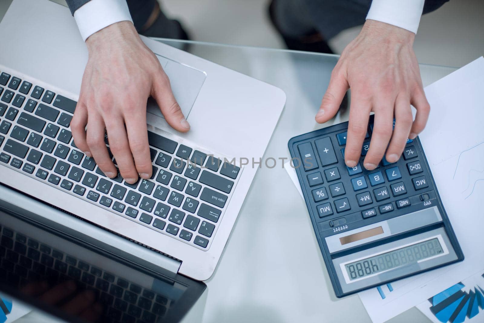 close up.businessman checking financial data.accounting and technology