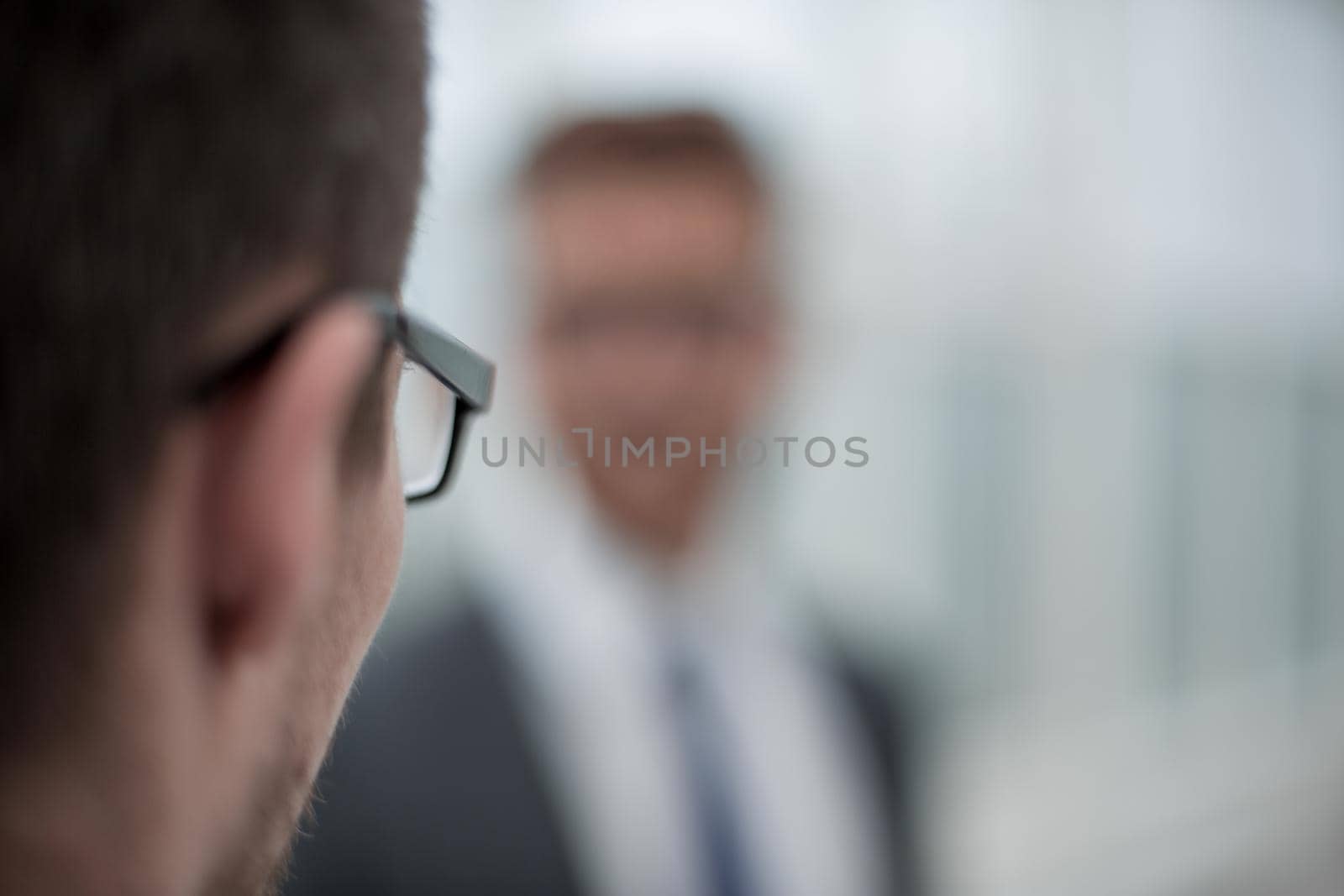 business background. blurred image of business people in the office