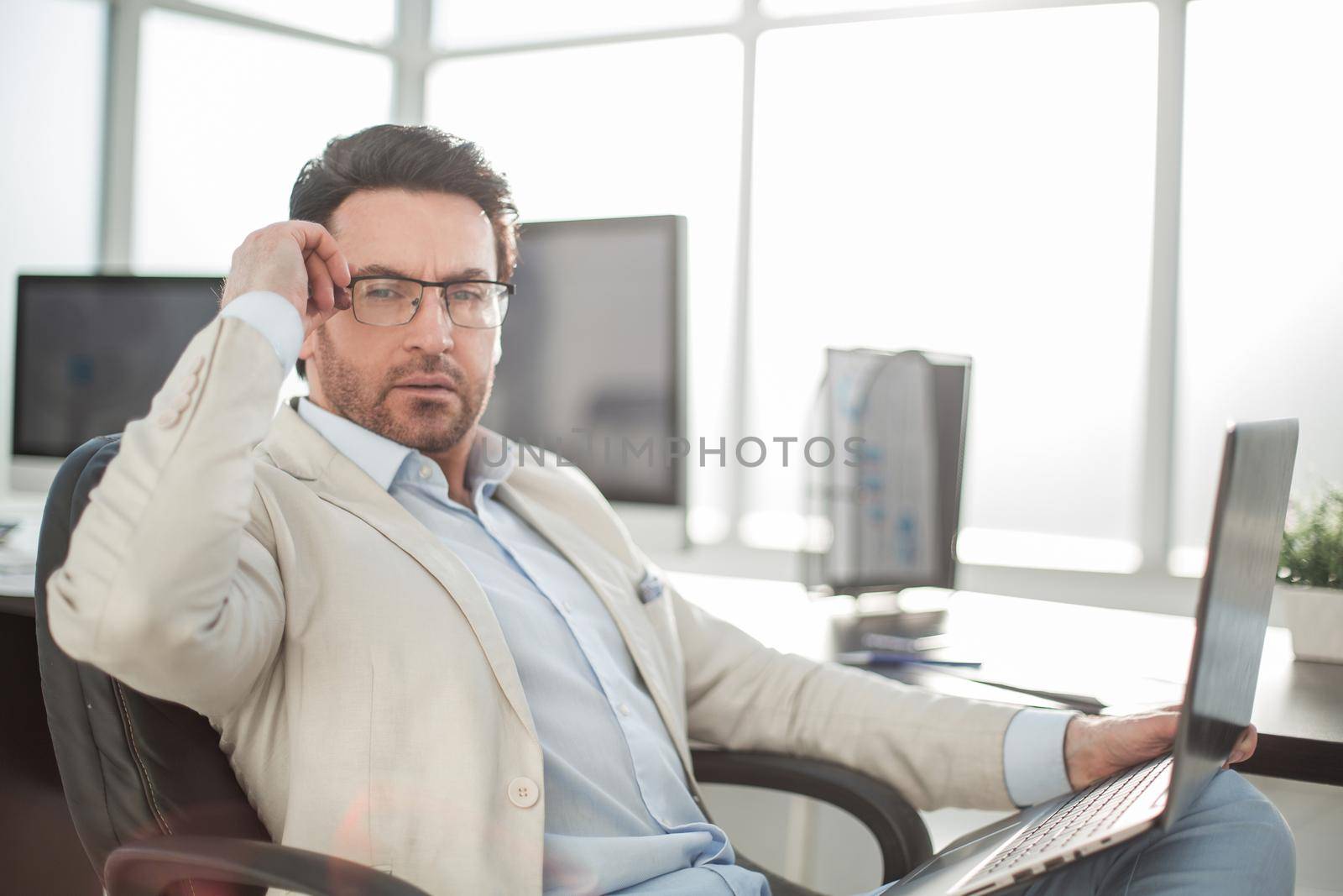 close up.a successful man with a laptop.people and technology