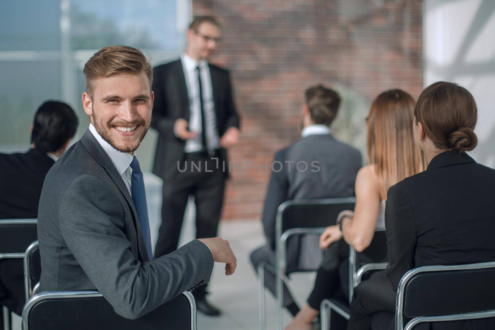 young businessman sitting in the conference room.business and education
