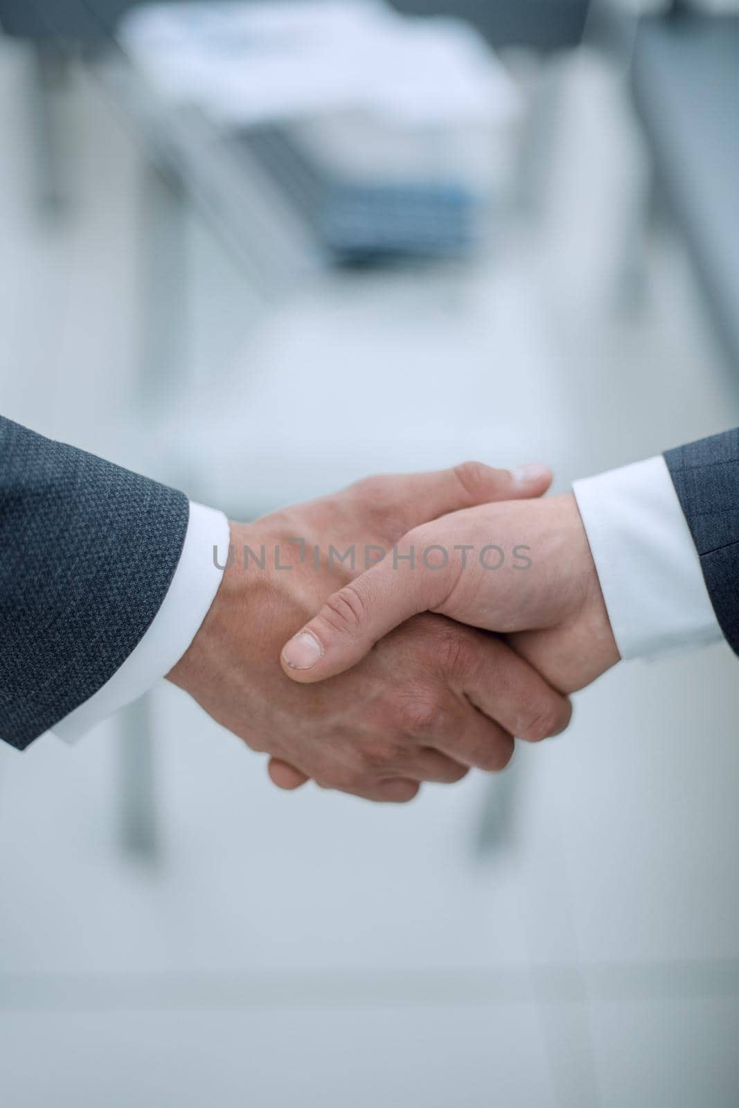 close up.handshake of business people on blurred background by asdf