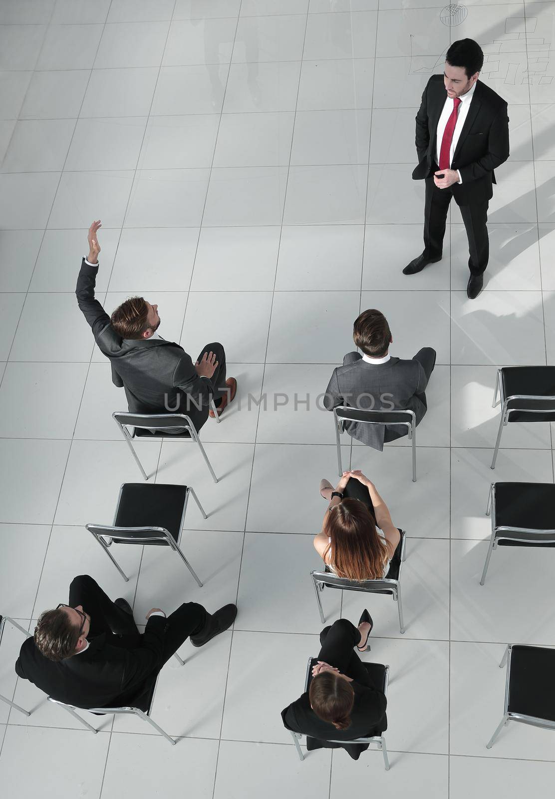 top view of the company's shareholders at a meeting