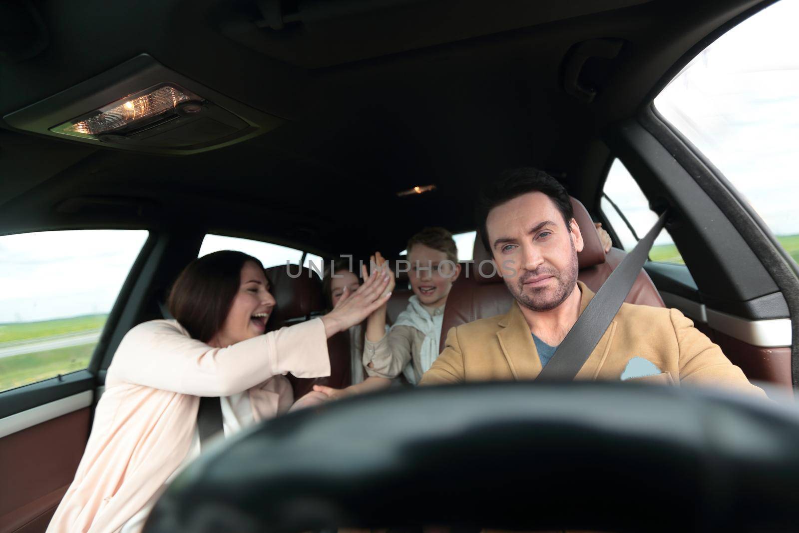 happy family travelling by car.family holiday concept