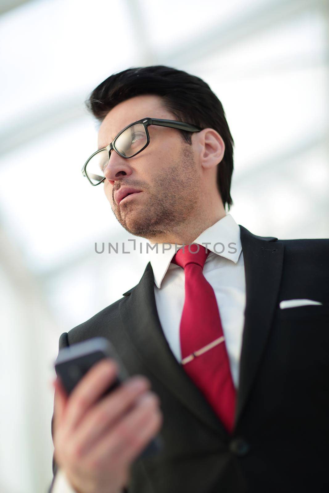 close up.portrait of a modern businessman.people and technology