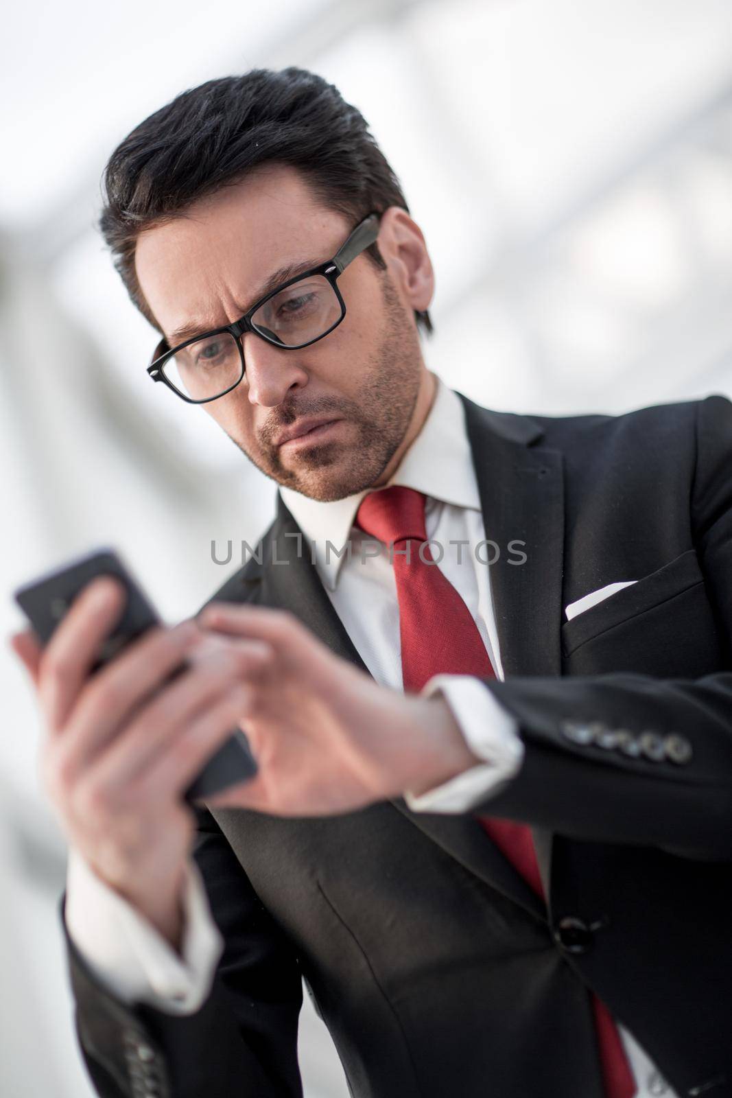 close up.portrait of a modern businessman.people and technology
