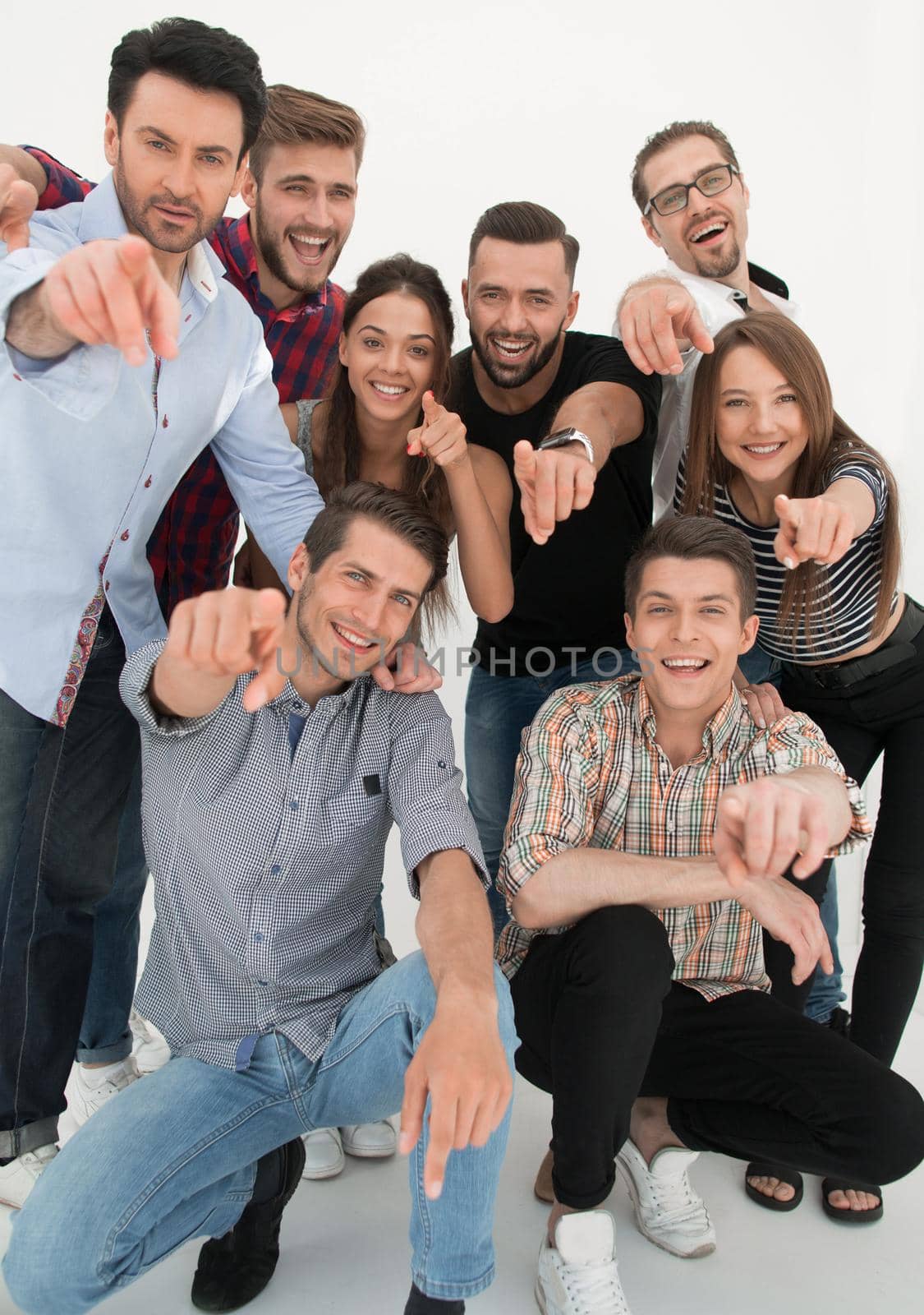 group of successful young men pointing at you by asdf