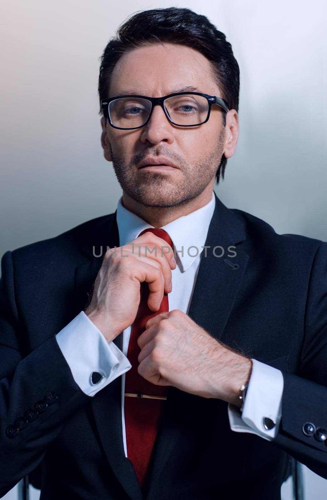 close up.businessman adjusting his tie.business people