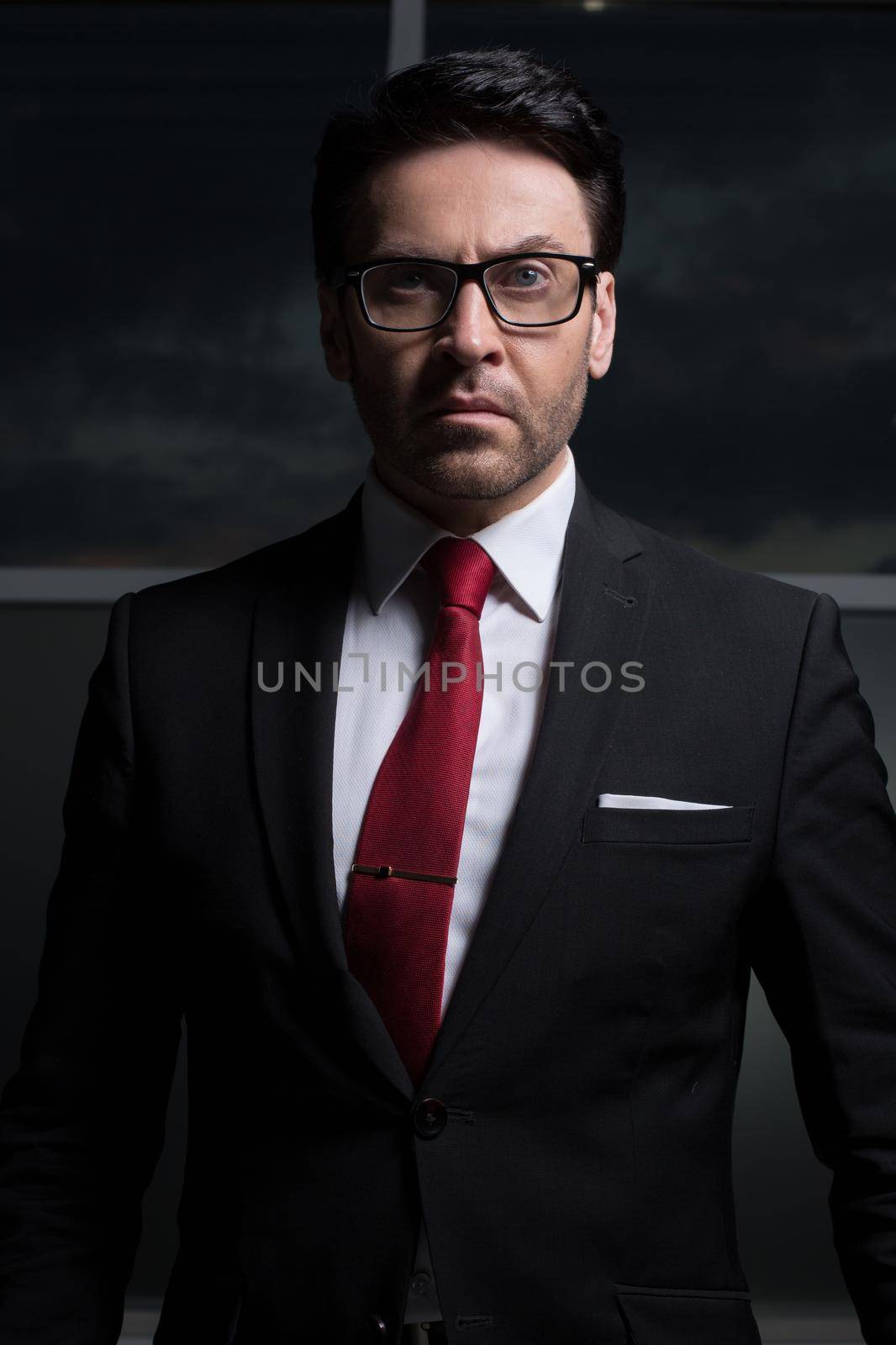 close up.portrait of a serious businessman by asdf