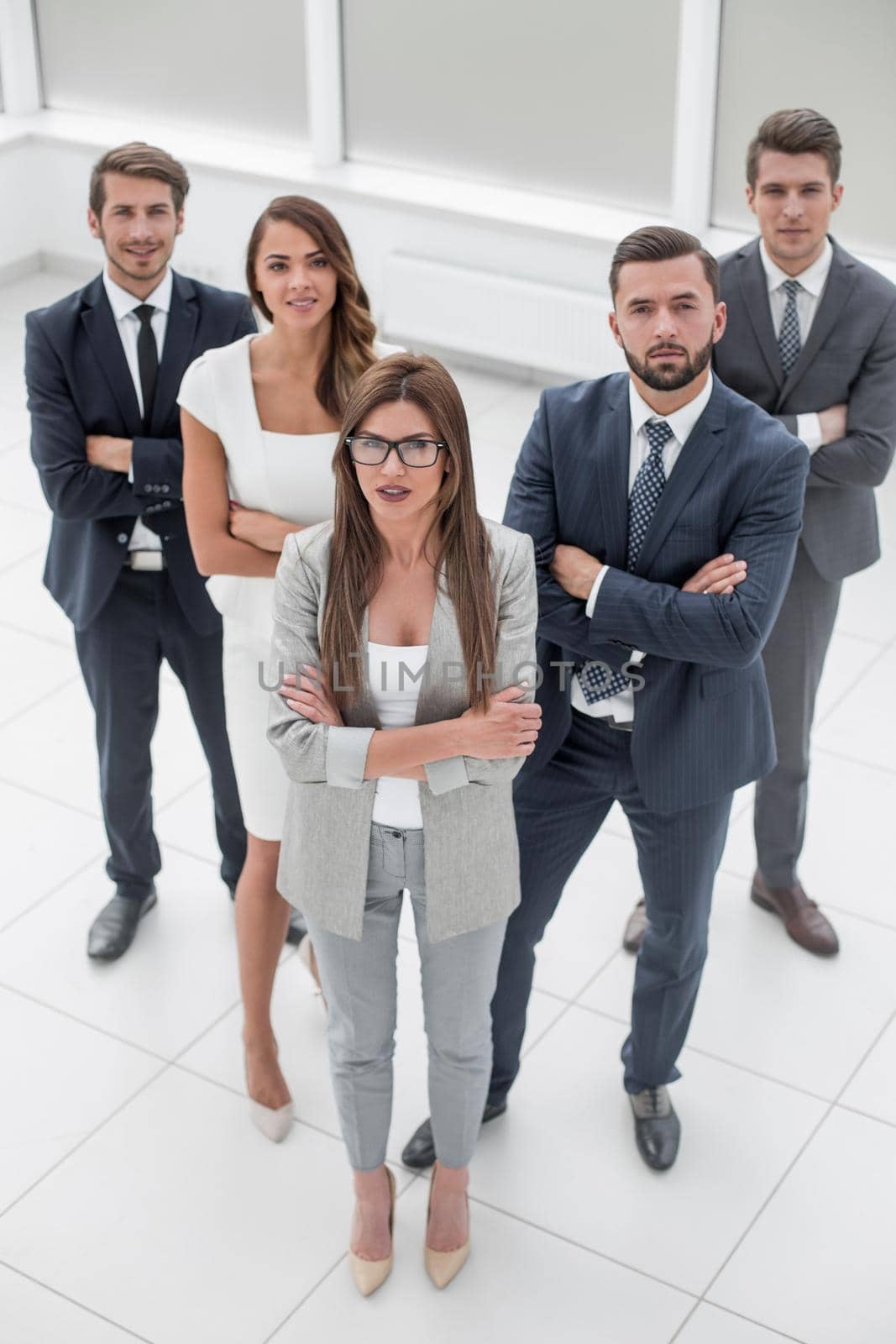 business woman standing in front of business team. the concept of teamwork